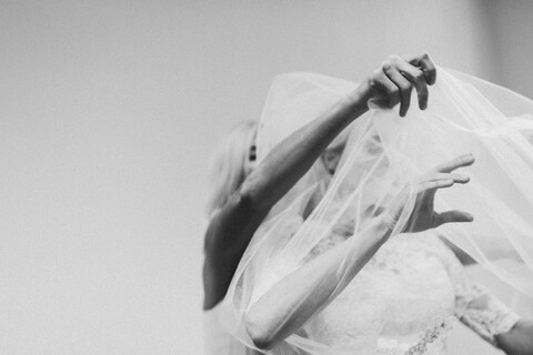 bride getting ready at the pinehurst village chapel
