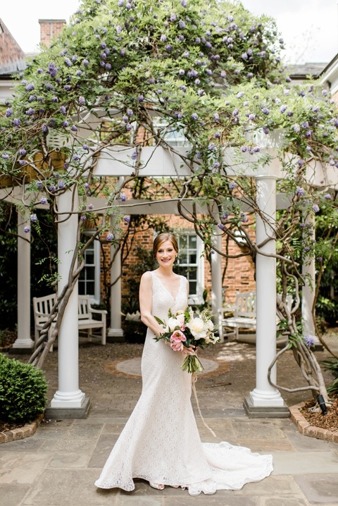 Mikaela Lace wedding dress. Coordination by Kast Events at the Chapel Hill Carriage House. Photo by Caroline Lima.