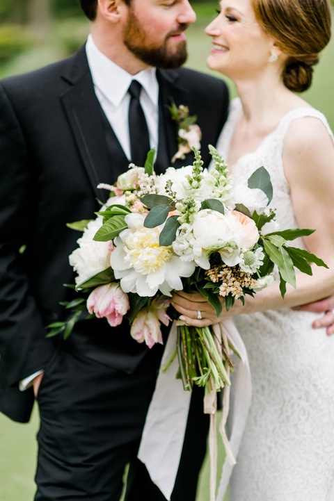 Blush and yellow peony bouquet. Coordination by Kast Events at the Chapel Hill Carriage House. Photo by Caroline Lima.