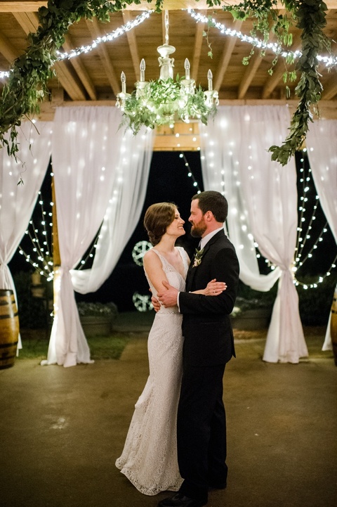 Chandeliers with greeneries. Blush and gold wedding ideas. Coordination by Kast Events at the Chapel Hill Carriage House. Photo by Caroline Lima.