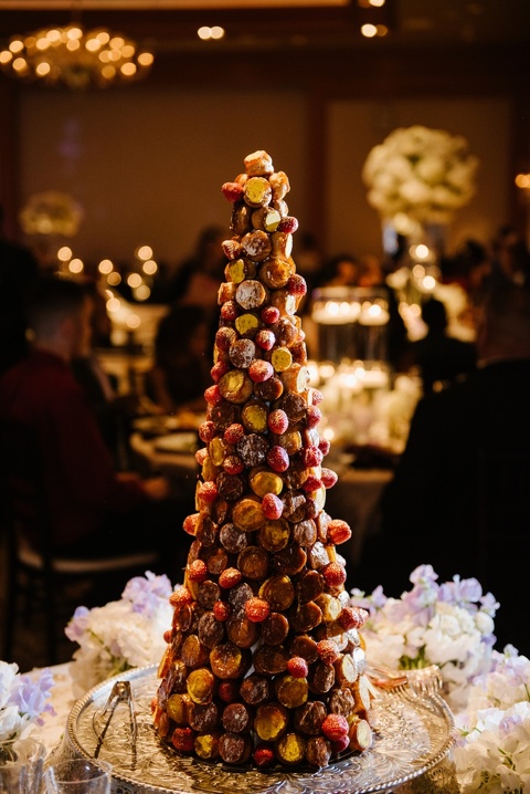 White, gold and plum wedding at The Umstead. Croquembouche cake. Coordination by A Southern Soiree. 