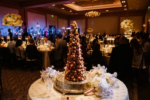White, gold and plum wedding at The Umstead. Croquembouche cake. Coordination by A Southern Soiree. 