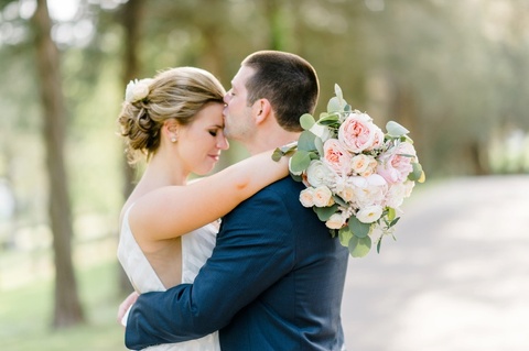Outdoor farm wedding in Richmond VA coordinated by Make It Posh Events. Flowers by Petals and Twigs. Hayley Paige striped dress. Photo by Caroline Lima.