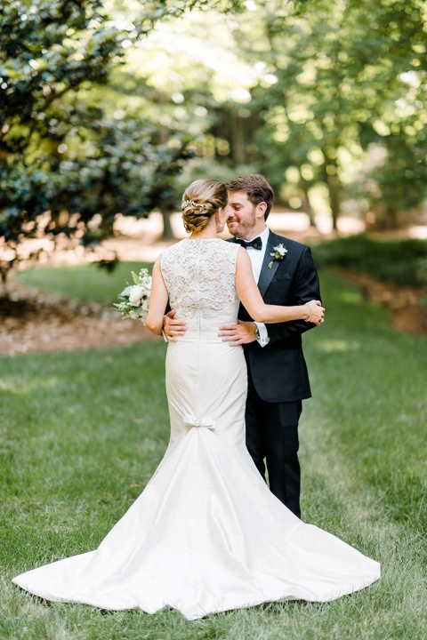 Paloma Blanca wedding dress. Bride and Groom photos at the Umstead Hotel and Spa. 