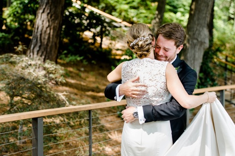 Bride and groom emotional first look at the Umstead Hotel and Spa.
