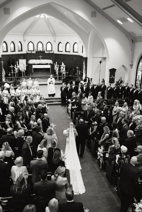 Bride walking down the aisle at the Christ Episcopal Church