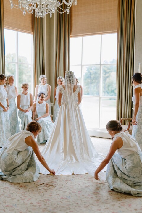 Bridesmaids wearing custom made skirts at the Charlotte Country Club