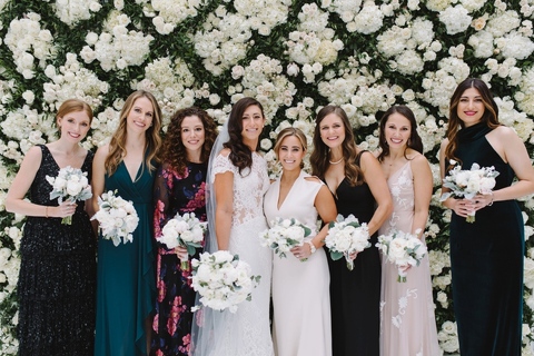bridesmaids wearing mismatched dresses 